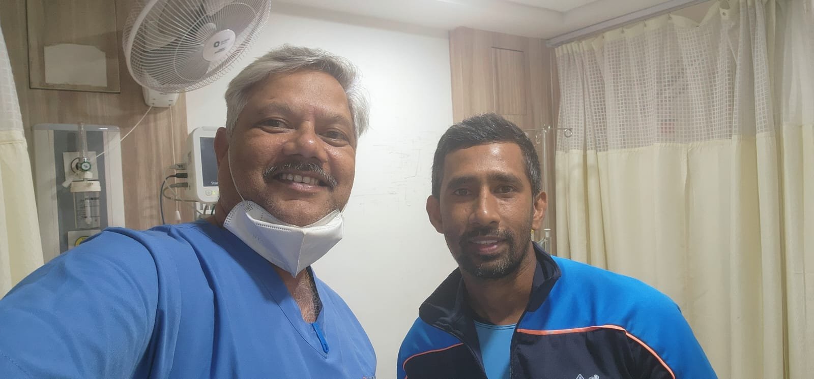 Dr Ashish Pardhy with Wriddhiman Saha